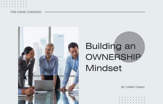 Employees collaborating to build ownership mindset at work